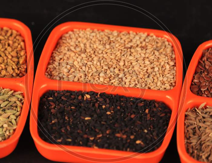 Black And White Sesame Seeds In Plate,Top View,Black And White Sesame In A Orenge Plate On Agriculture Background,Hd Footage Of Sesame Seeds