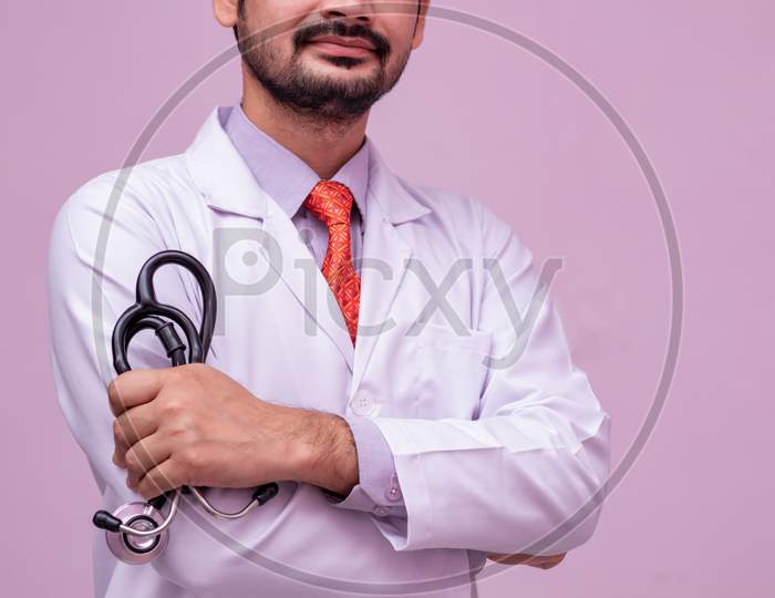 Healthcare And Medical Concept. Medicine Doctor With Stethoscope In Hand On Isolated Background.
