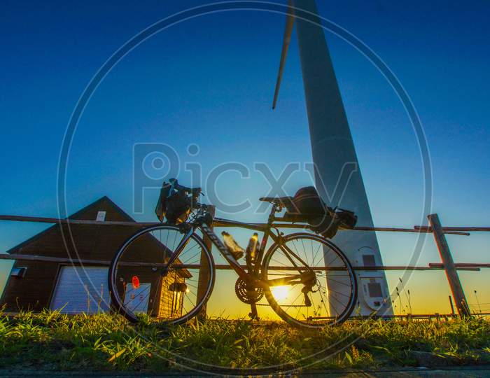 Bicycles And Wind Power Generation And Evening