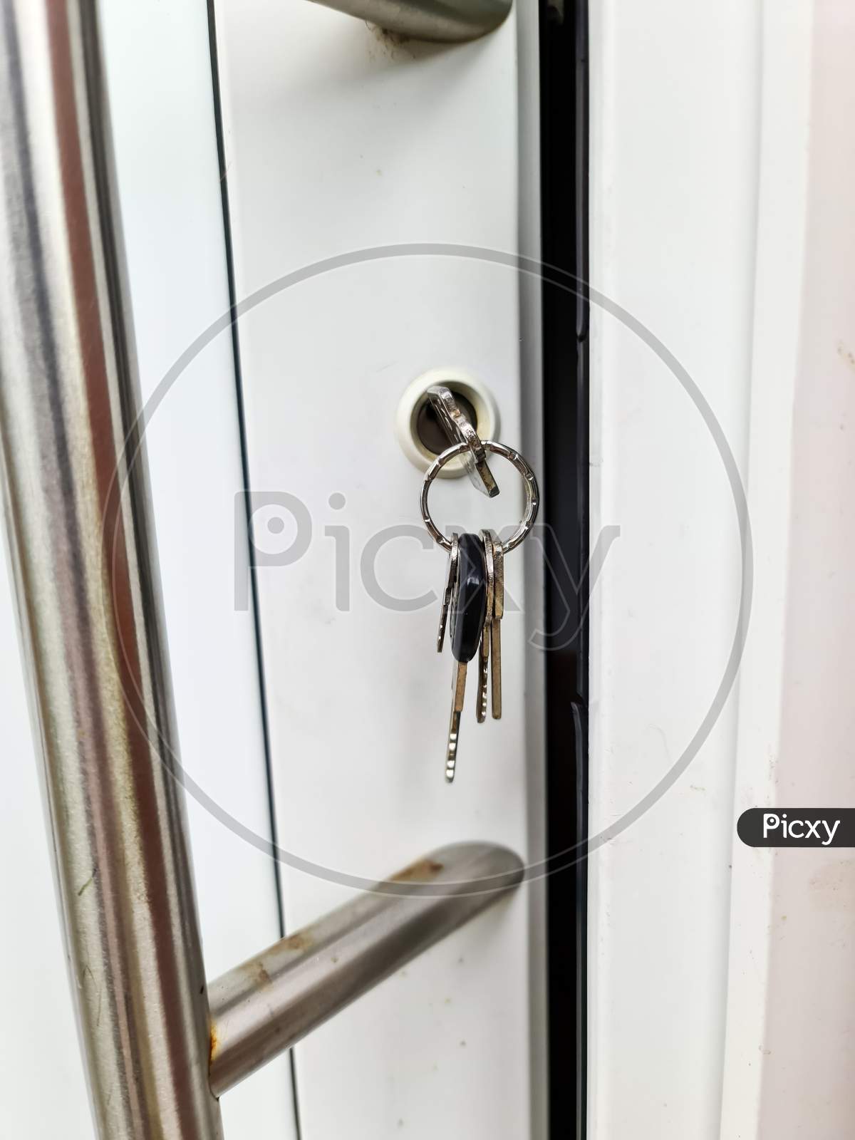 Open Apartment Door With A Key In The Lock - Security And Protection Against Burglary.