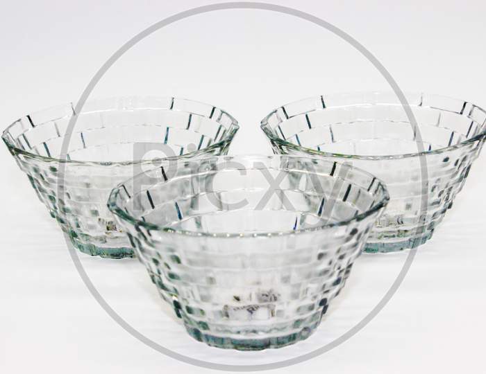 Glass Bowls On White Background With Selective Focus