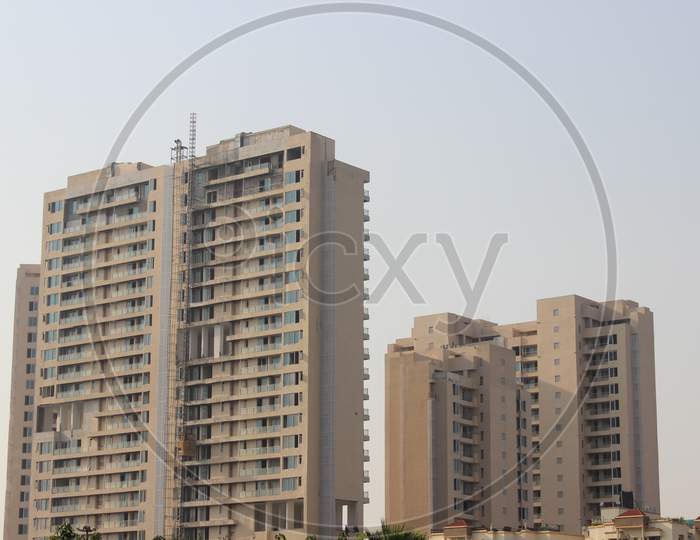 A Picture Of Residential Building With Sky Background