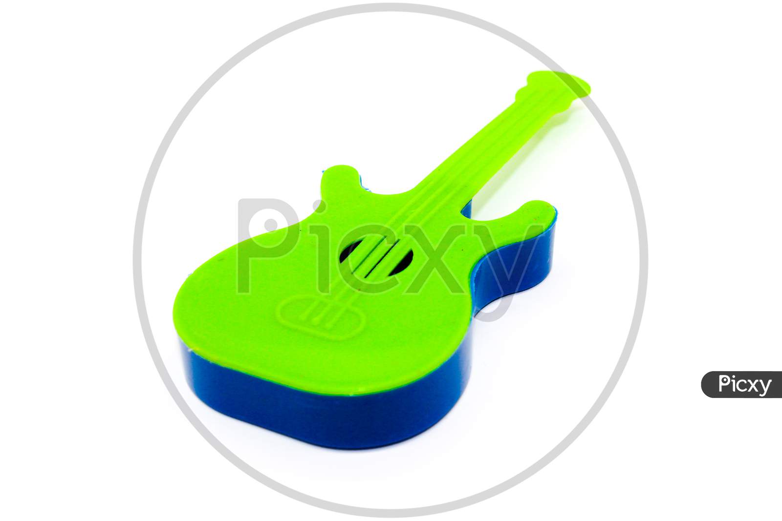 Toy Guitar On White Background With Selective Focus