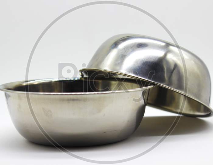 Stainless Steel Bowl On White Background With Selective Focus