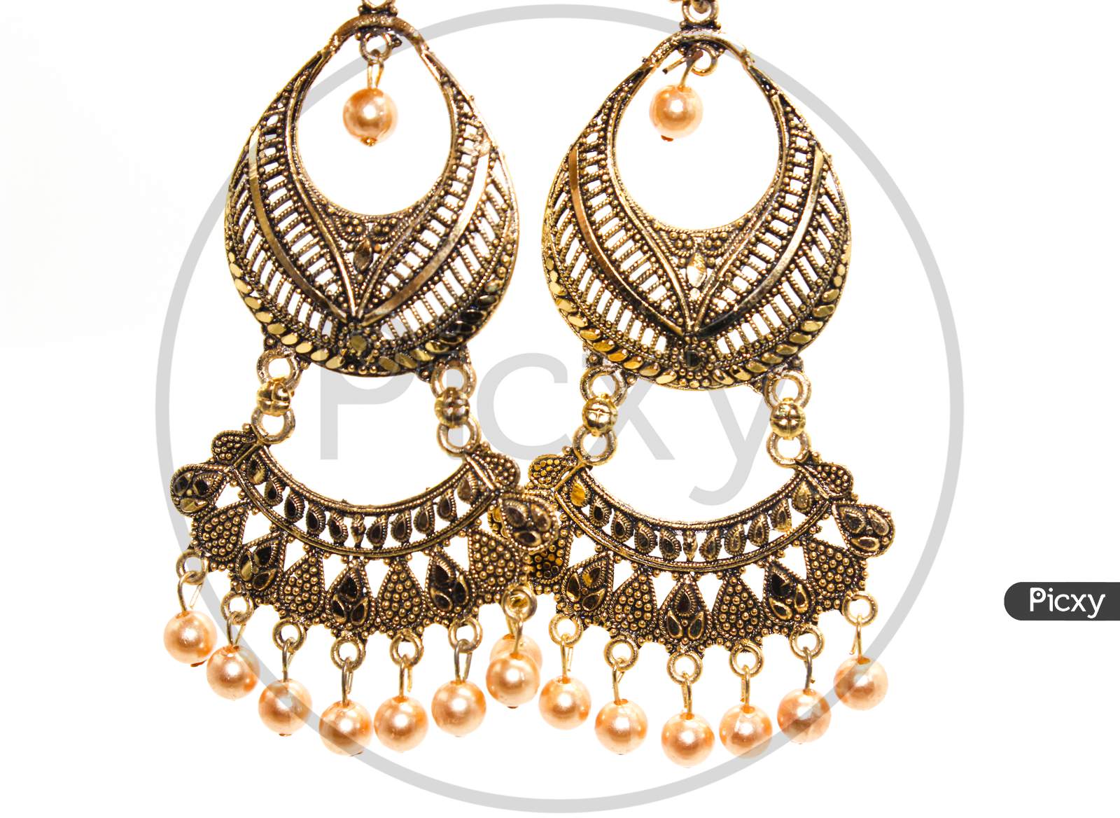 Earrings On White Background With Selective Focus