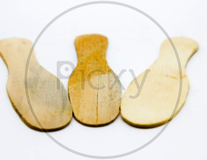 Wood Spoon Isolated On White Background With Selective Focus