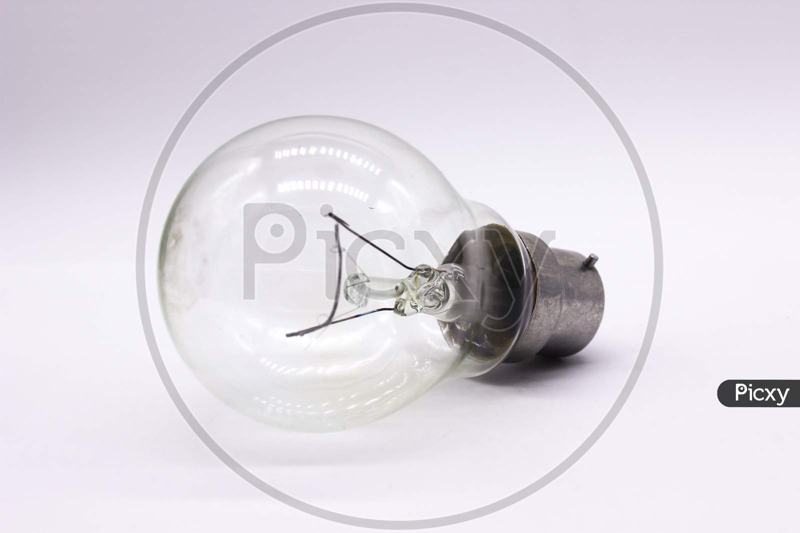 Light Bulb On White Background With Selective Focus