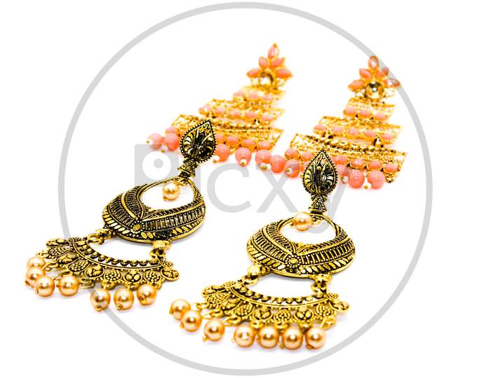 Earrings Isolated On White Background With Selective Focus