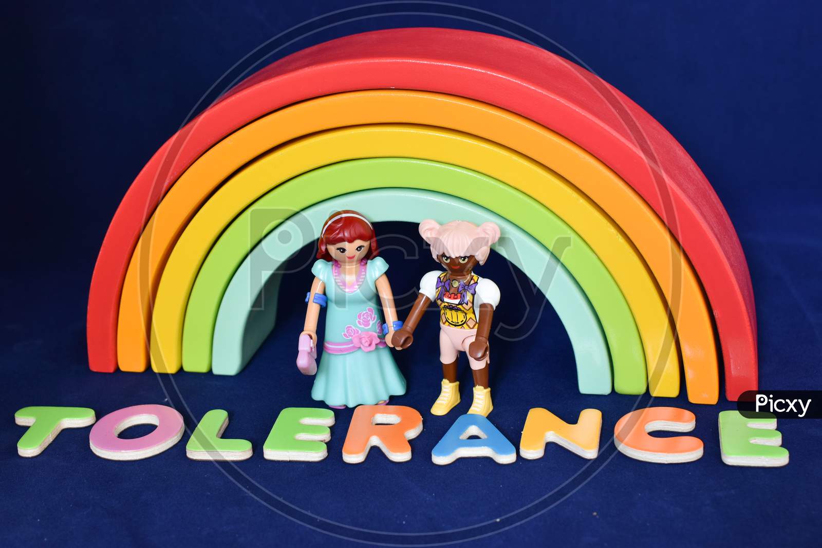 Vaduz, Liechtenstein, October 15, 2021 Lesbian Human Toy Pair In Front Of A Rainbow