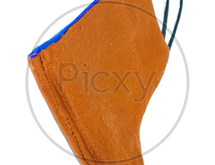 Face Mask On White Background With Selective Focus