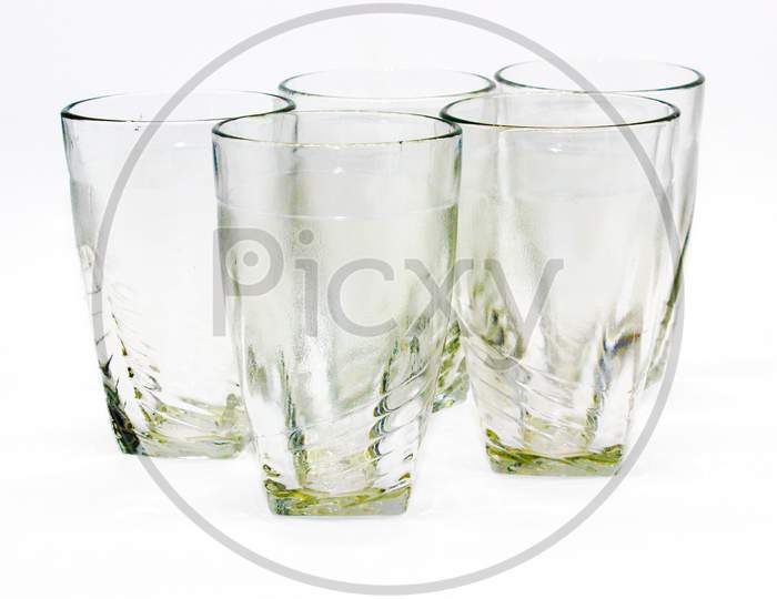 Glass Tumblers On White Background With Selective Focus