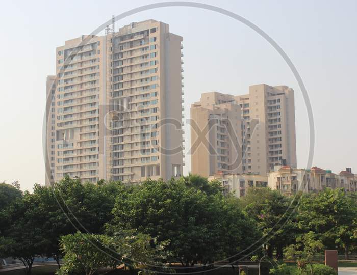 A Picture Of Residential Building With Sky Background