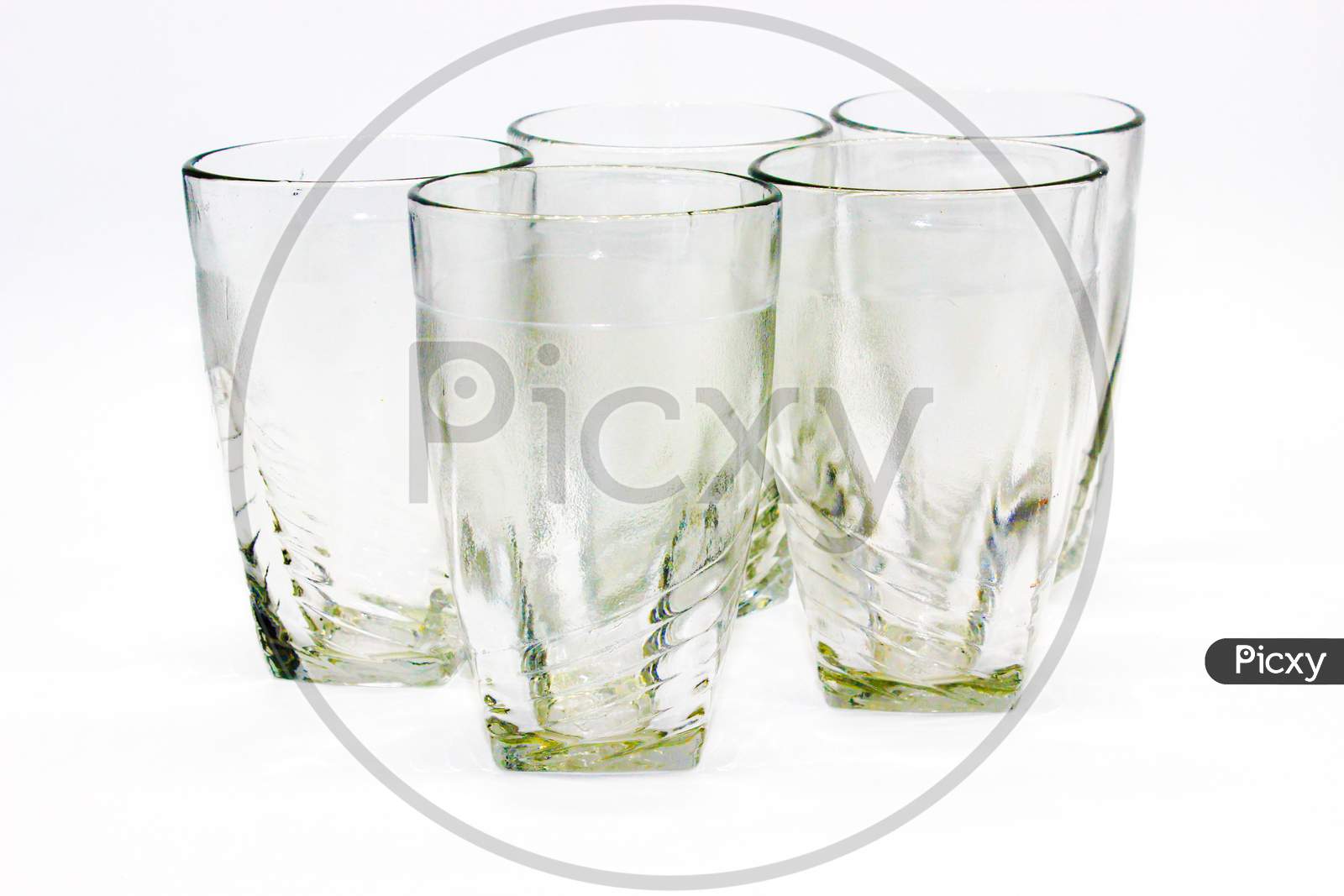 Glass Tumblers On White Background With Selective Focus