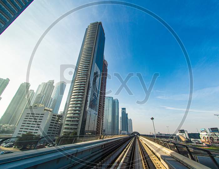 Uae Dubai Skyline Visible From The Dubai Metro