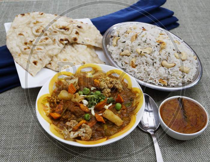 Mix Vegetable Curry, Vegetable Pulao, Butter Naan