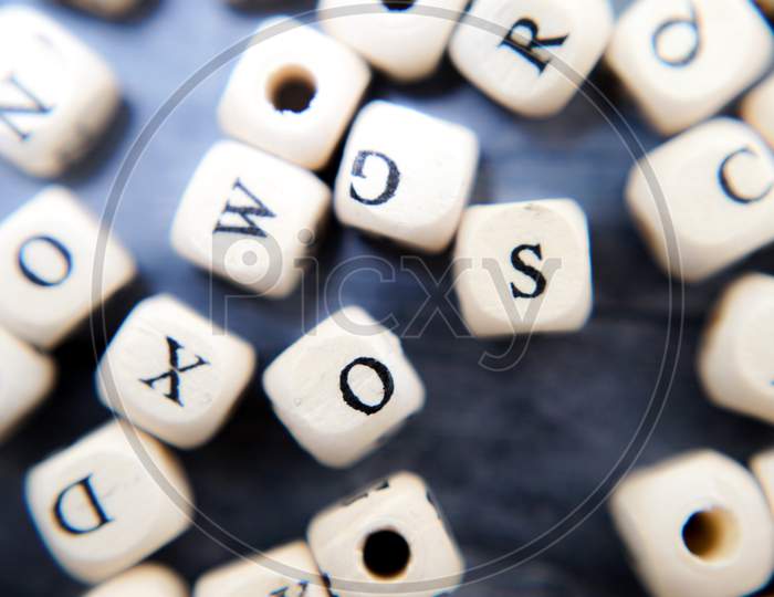 Block Of Alphabet Studded On The Floor