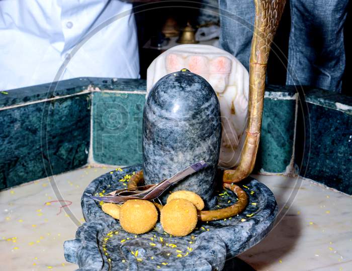 Closeup Of Shiva Linga Statue, A Symbol Or Icon Of Hindu God Shiva Used To Perform Puja Or Prayers