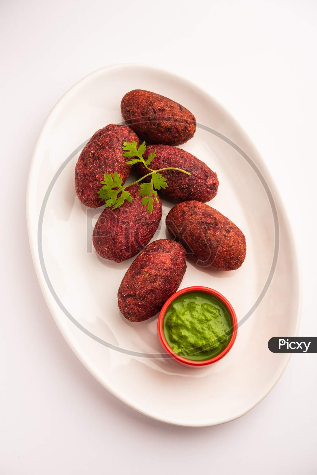 Beet Root Patties Or Cutlet Or Tikki Served With Green Chutney