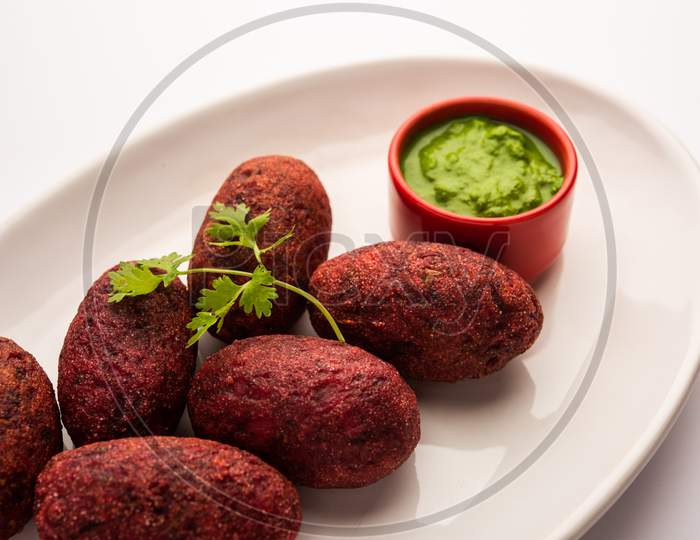 Beet Root Patties Or Cutlet Or Tikki Served With Green Chutney