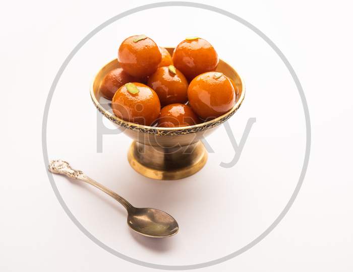 Indian Sweet Food Gulab Jamun Served In A Round Ceramic Bowl
