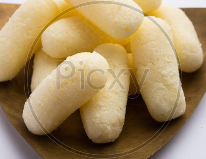 Cham Cham Is A Bengali Sweet Made By Curdling Milk And Then Shaping The Coagulated Solids To Cylindrical Shape Pieces