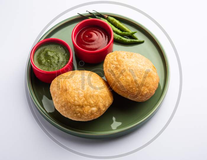 Kachori Is A Flat Spicy Snack From India Also Spelled As Kachauri And Kachodi. Served With Tomato Ketchup. Selective Focus