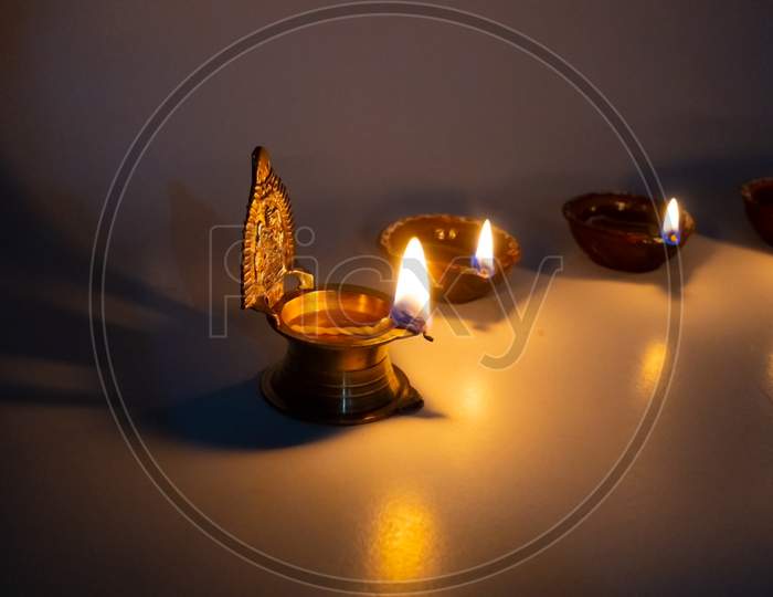 Diwali celebration with burning oil lamp