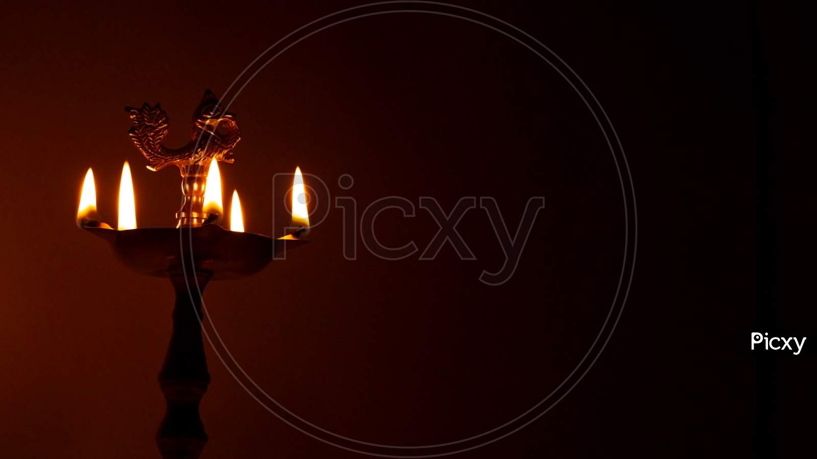 Diwali celebration with burning oil lamp
