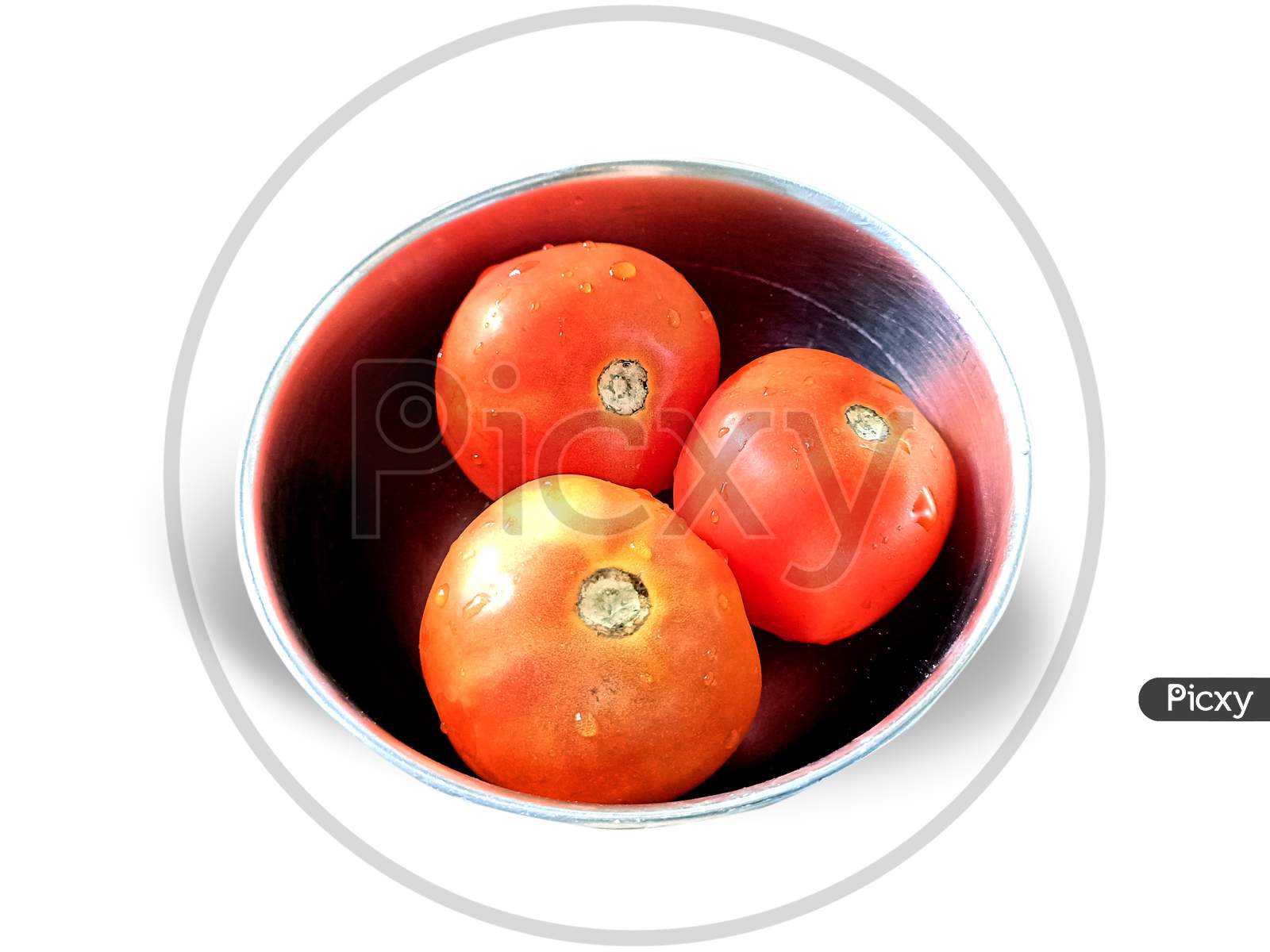 Top View Of Three Ripe Tomatoes In A Steel Bowl On White Background