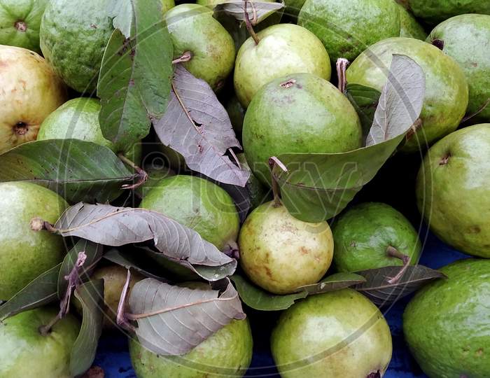 To Sell A Bunch Of Guava On The Street Market