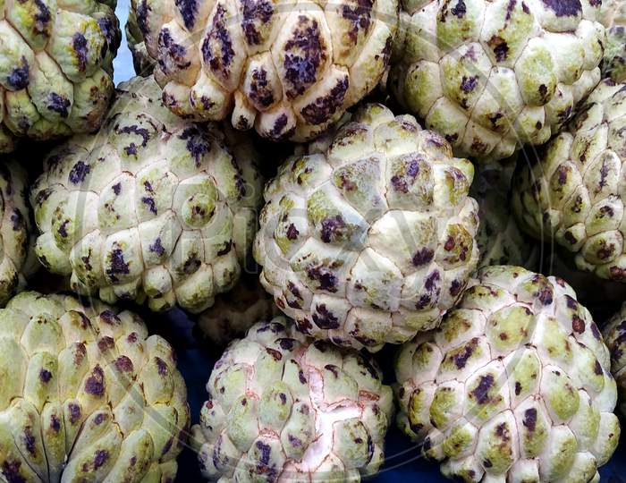 Close Up Custard Apple Fruit To Sell In Fresh Market. Annona Reticulata