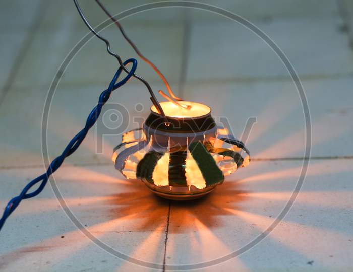A Handmade Lanterns Shine With Candles Made By Cans In The Mid-Autumn Holiday