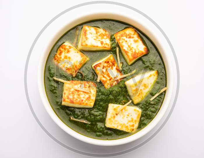 Palak Paneer Or Spinach And Cottage Cheese Curry Served With Rice And Chapati