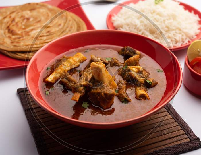 Mutton Or Gosht Masala Or Indian Lamb Rogan Josh With Some Seasoning, Served With Naan, Paratha Or Roti With Rice
