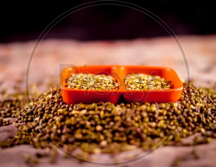Green And Yellow Moong Mung Dal Lentil Pulse Bean On Black Background, Yellow Mung Dal And Green Moong Bean Rotation On Wooden Table, High Protein Moong Dal