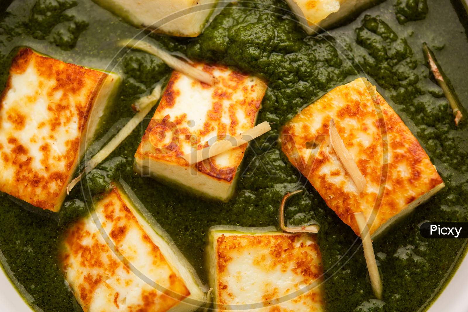 Palak Paneer Or Spinach And Cottage Cheese Curry Served With Rice And Chapati