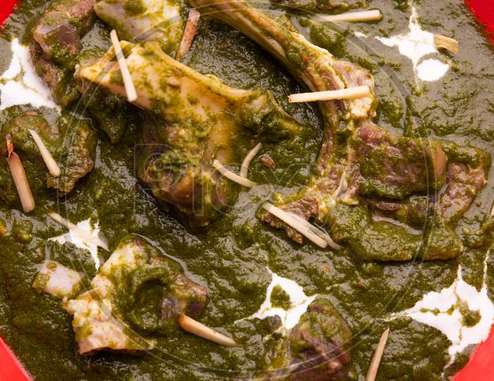 Palak Gosht Or Mutton Curry, Indian Style Spinach And Lamb Curry Served With Rice And Laccha Paratha
