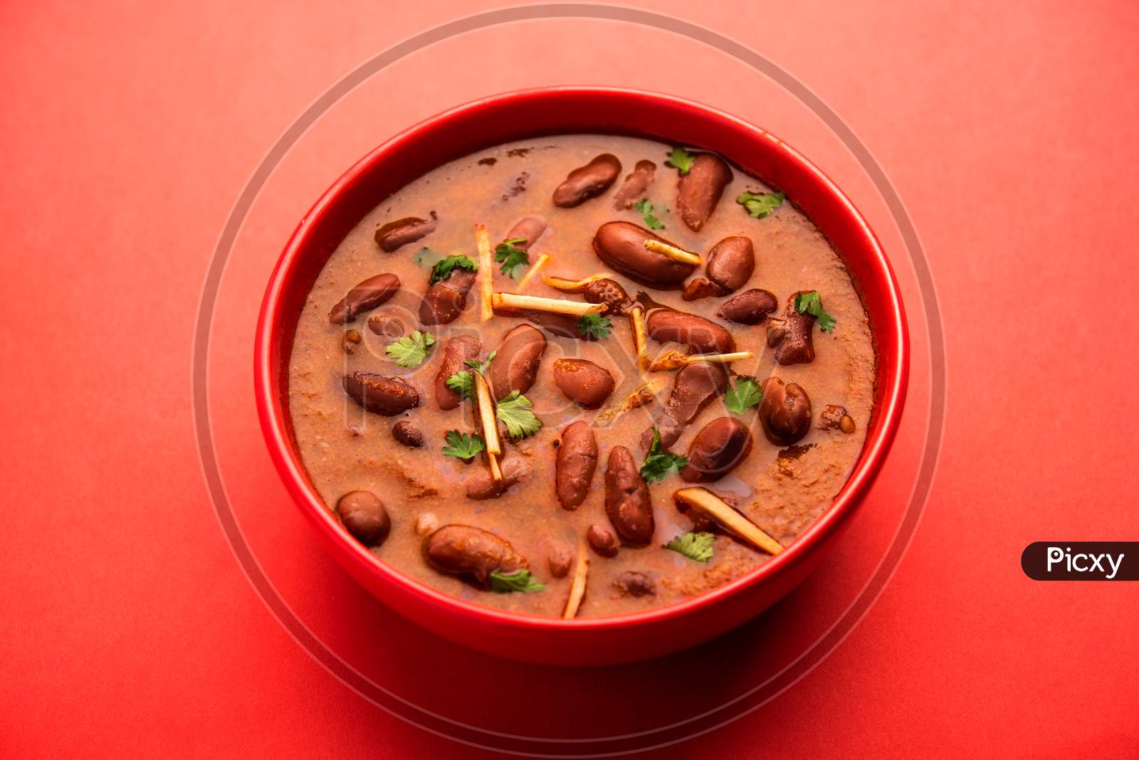 Rajma Curry Or Rajmah Masala Served With Rice And Laccha Paratha