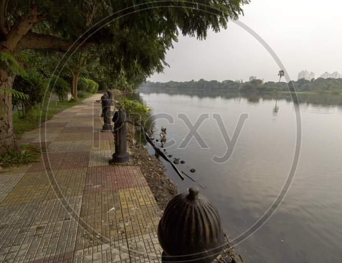 Beautiful Rabindra Sarobar Lake With Vintage Style Railing And Footpath