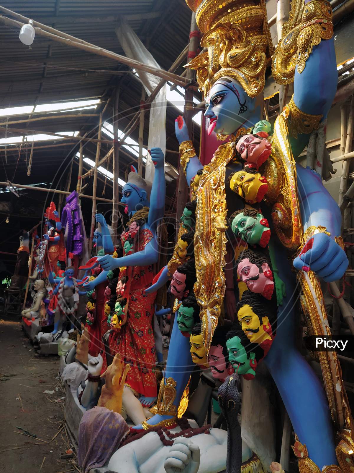 Many idols of Kali, Hindu goddess (Thakur) is being prepared in the place in Kumartuli, Kolkata India