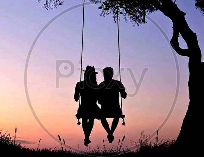Couple Or Girl Swinging From Top Of The Mountain With Sunset Background Editable Silhouette Illustration