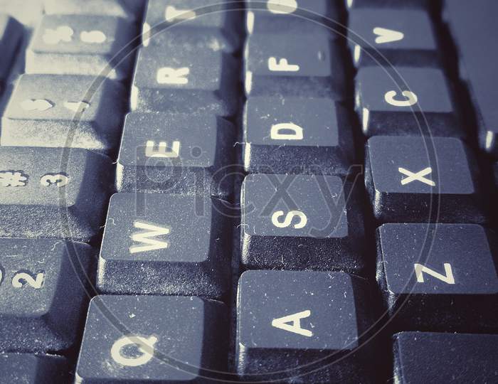 Selective focus of keyboard. Computer keyboard background