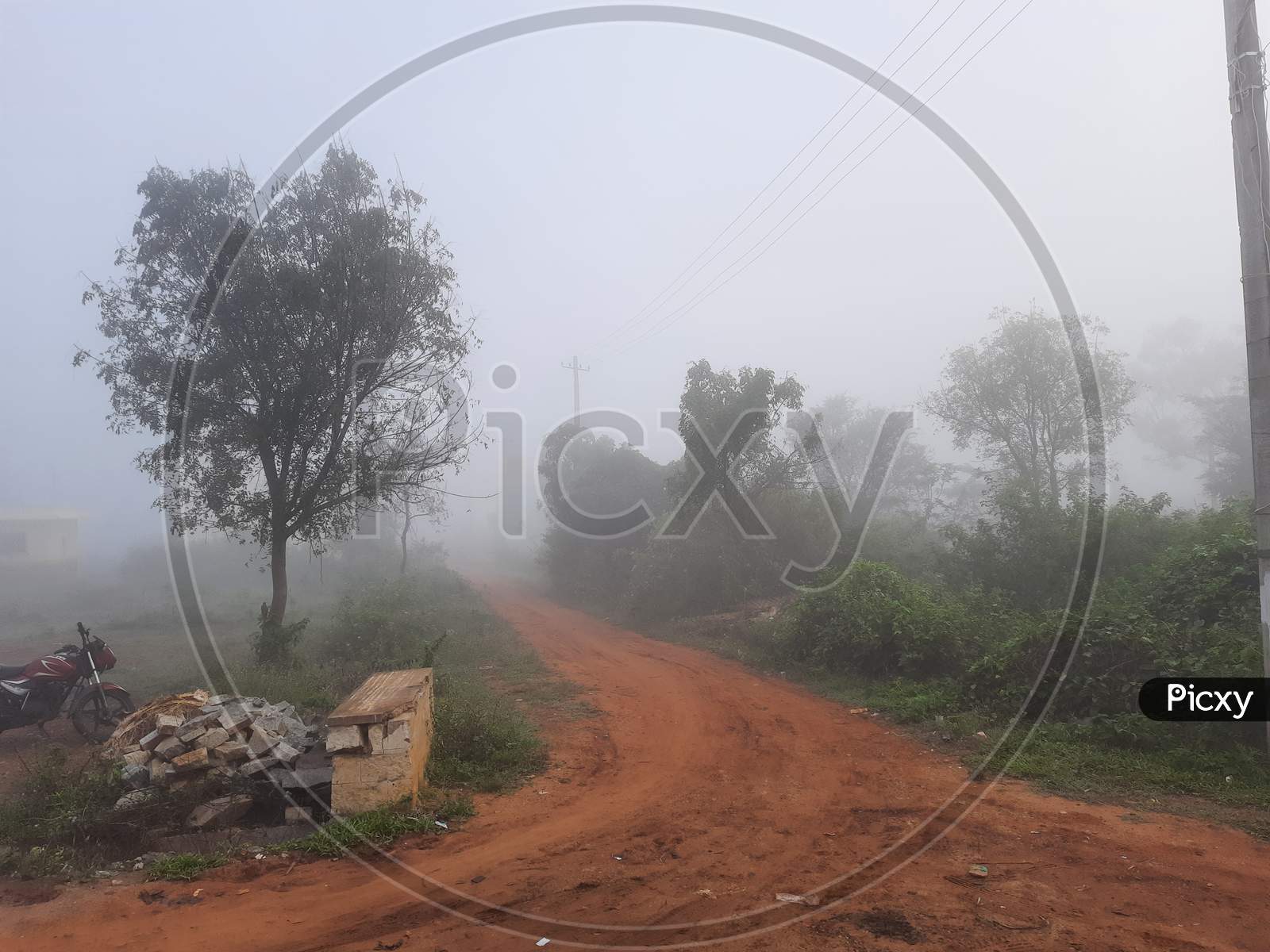 Closeup Of Beautiful View Of Misty Fog In A Rural Baiyandahalli Village, Nature And Building Of Bangalore