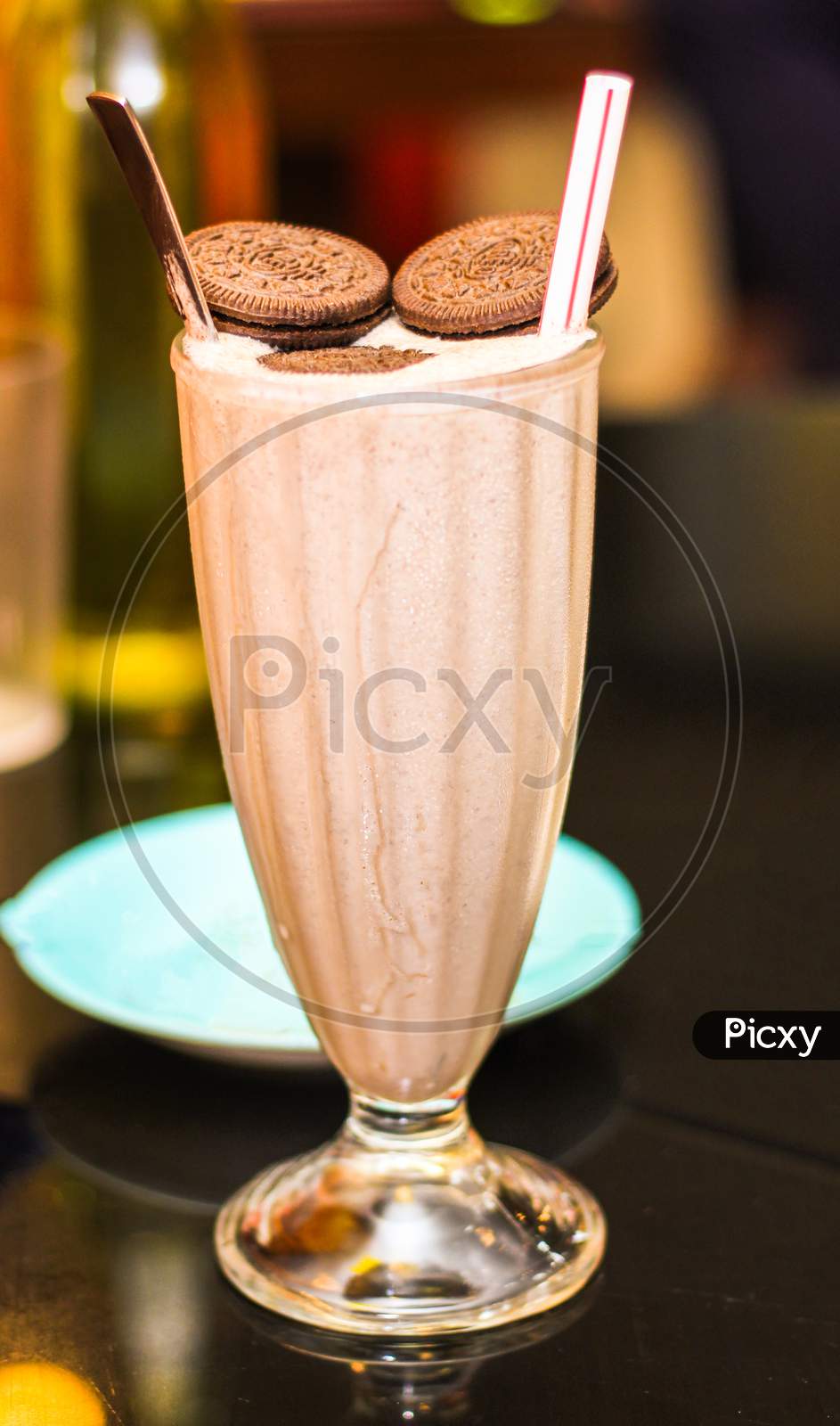 Cold Coffee With Chocolate Cookies Toppings.