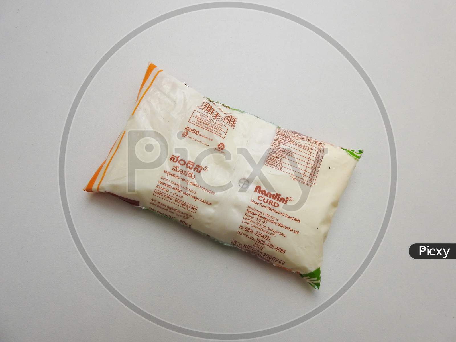 Image Of Closeup Of Kmf Nandini Curd 250Ml Yellow And White Color Pack image-of-closeup-of-kmf-nandini-curd-250ml-yellow-and-white-color-pack