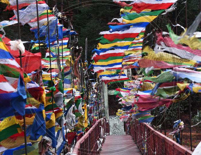 buddhist flags on the bridge