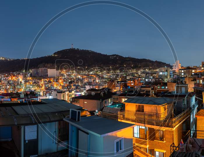 Itaewon District And Namsan Tower At Night In Seoul, South Korea