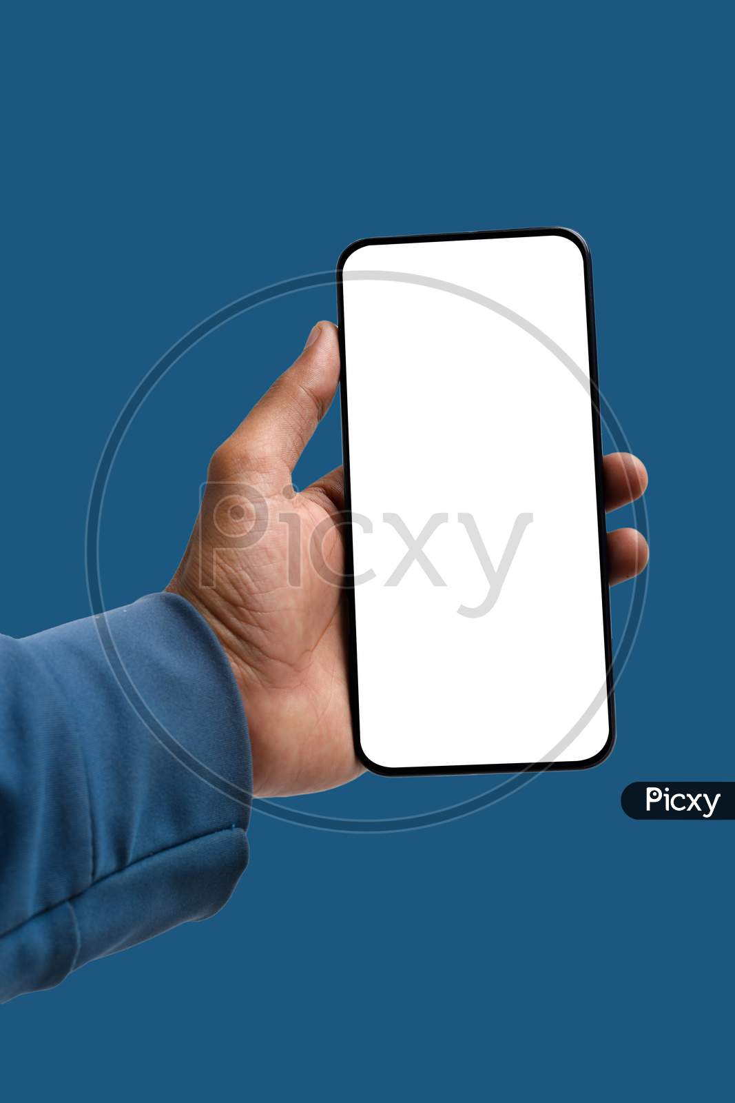 Holding Smartphone In Hand On Blue Background