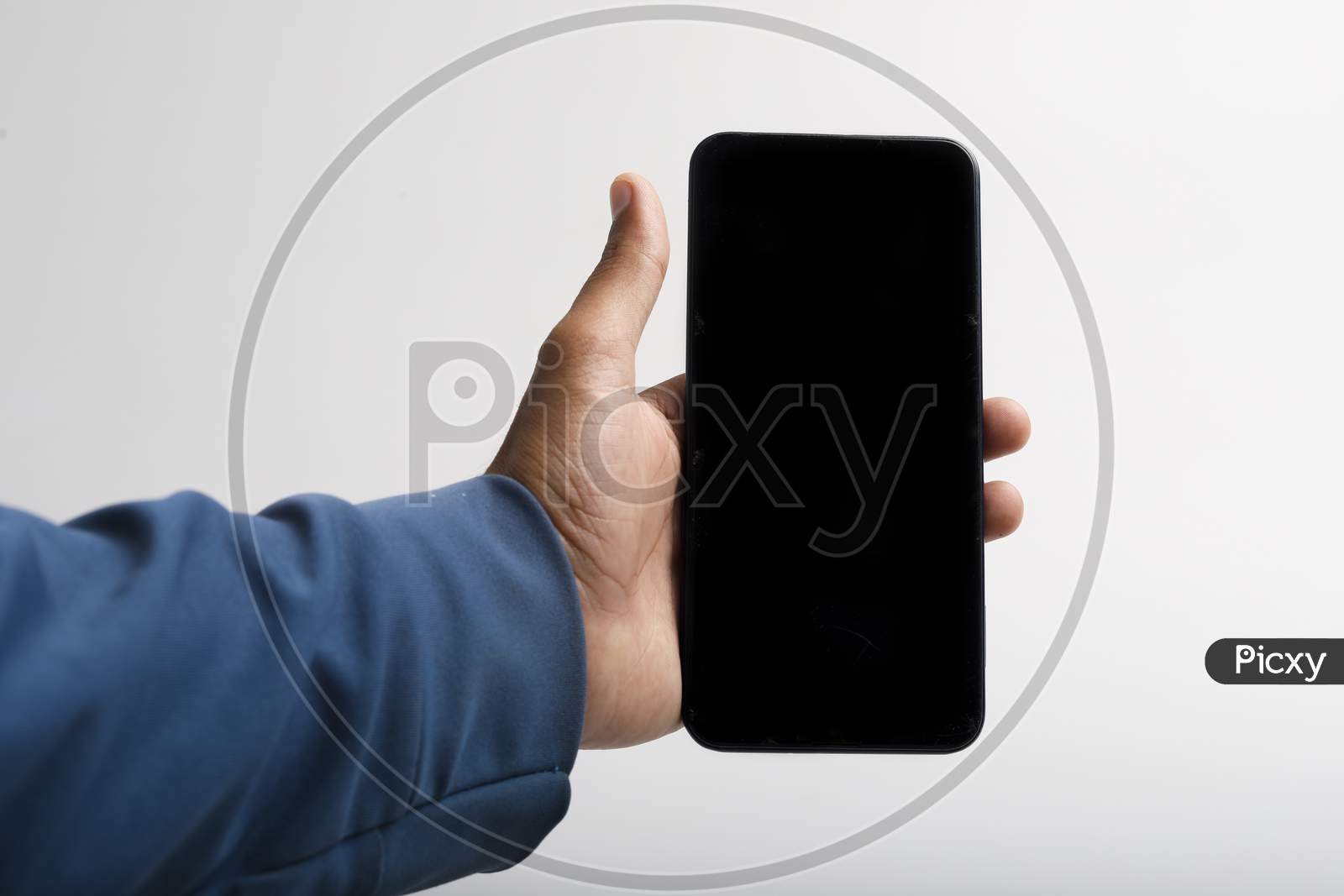 Holding Smartphone In Hand On White Background