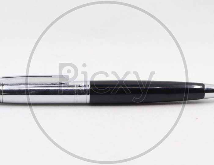 a black and silver colored luxury pen